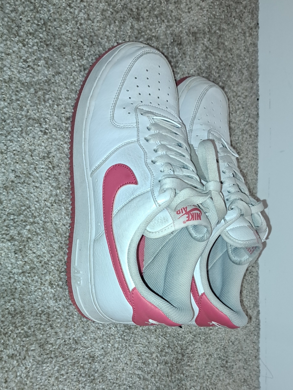 Nike Women's White Leather Sneakers with Pink Swoosh